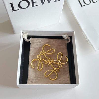Broche Acero Logo