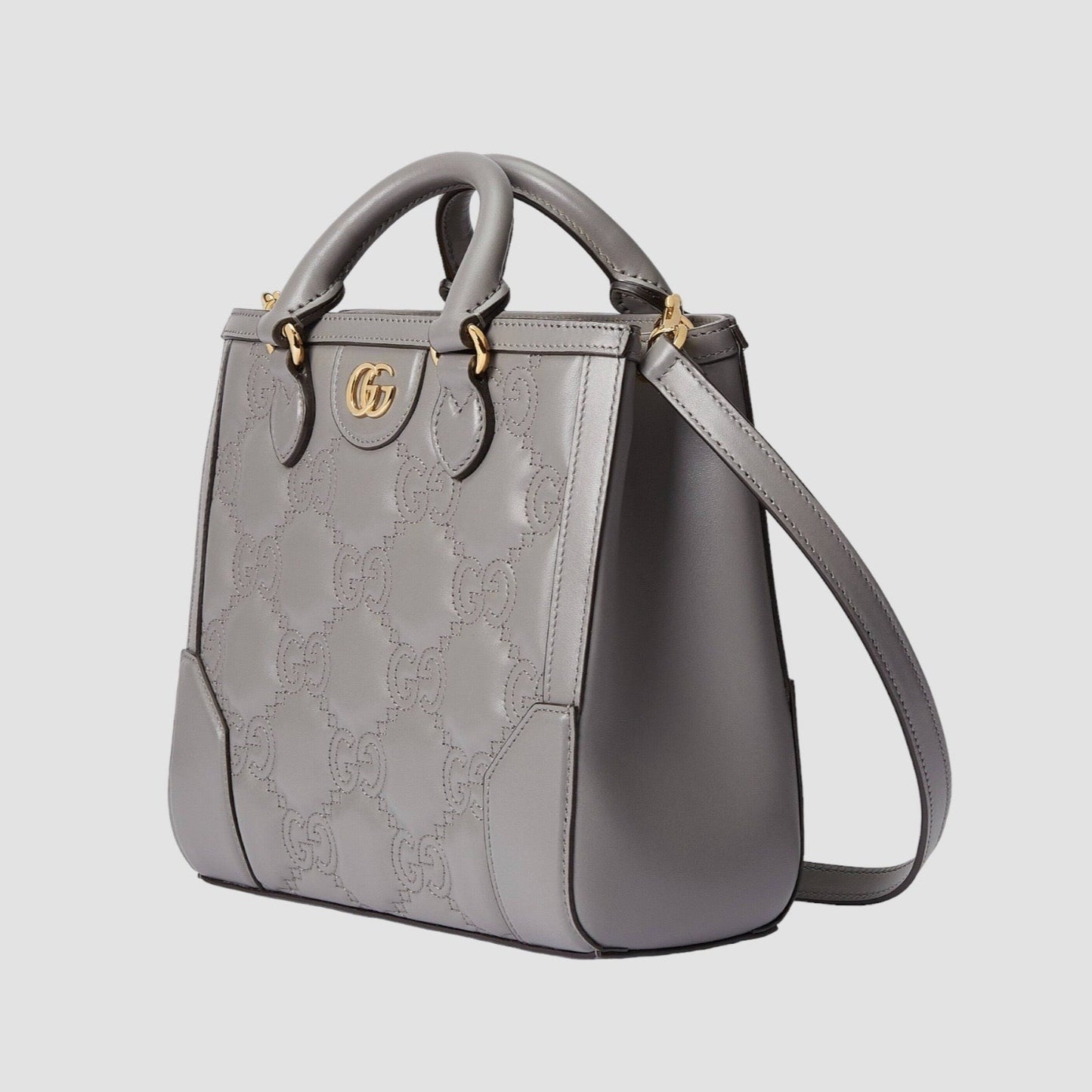 Minibolso de mano de matelassé con GG Gris