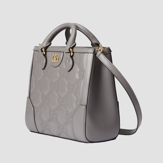 Minibolso de mano de matelassé con GG Gris