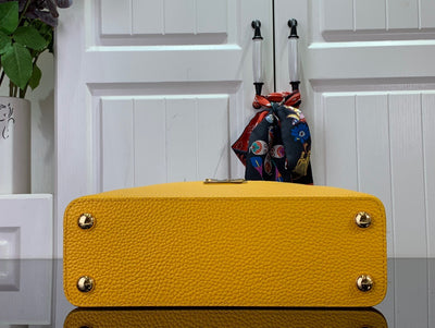Bolso Capucines Mini Safran