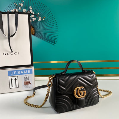 Minibolso GG Marmont con asa Negro