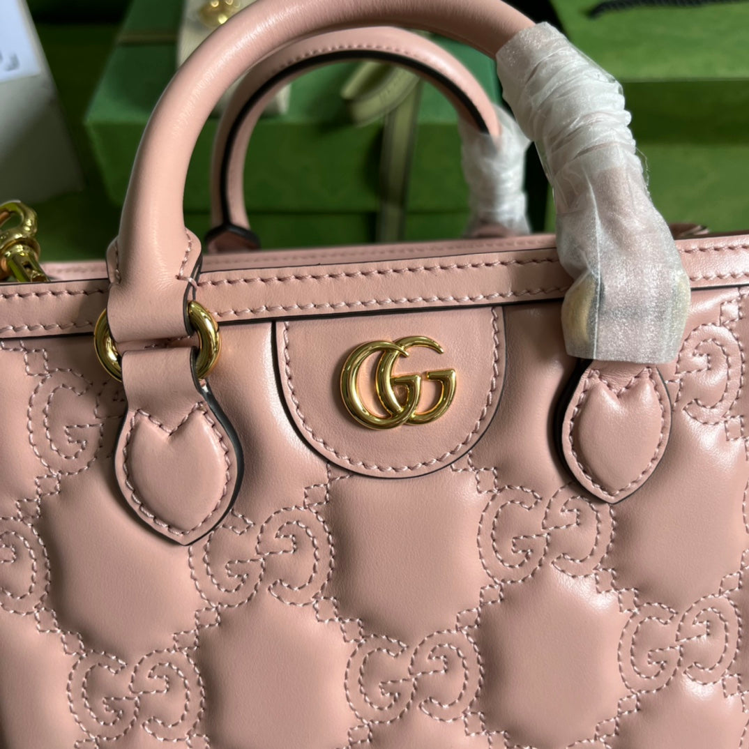 Minibolso de mano de matelassé con GG Rosa