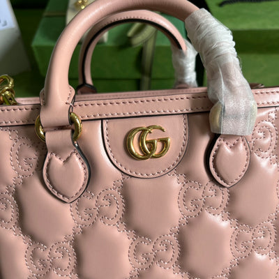 Minibolso de mano de matelassé con GG Rosa
