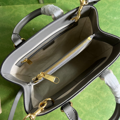 Minibolso de mano de matelassé con GG Gris