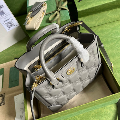 Minibolso de mano de matelassé con GG Gris