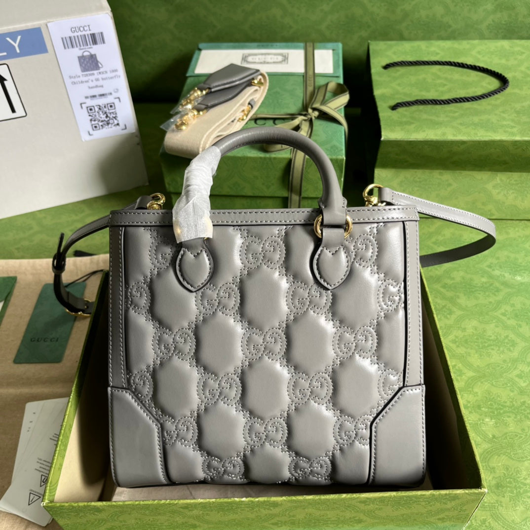 Minibolso de mano de matelassé con GG Gris