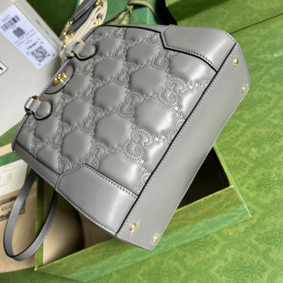 Minibolso de mano de matelassé con GG Gris