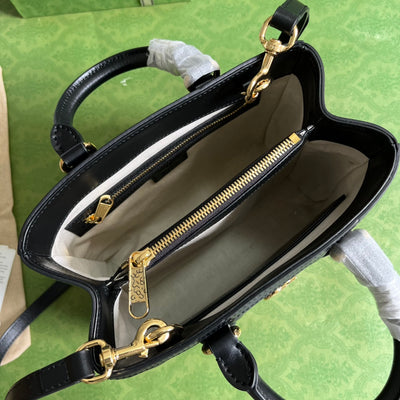 Minibolso de mano de matelassé con GG Negro