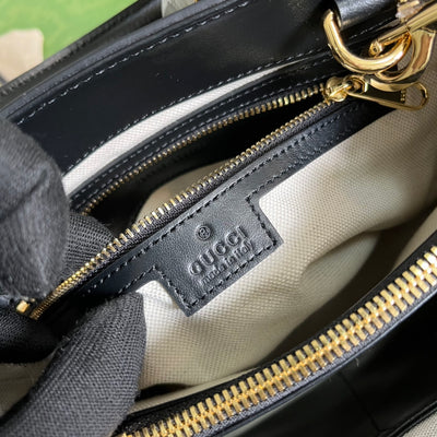 Minibolso de mano de matelassé con GG Negro