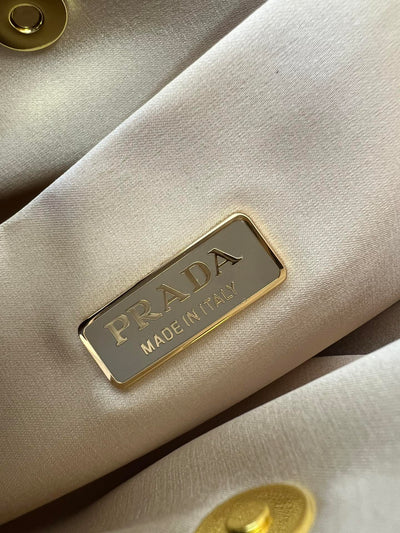 Bolso de satén Prada Cleo con cristales Dorado