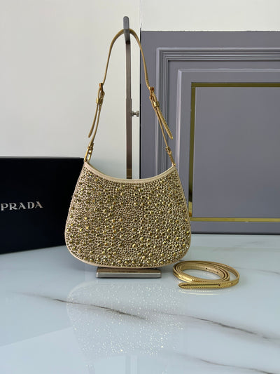 Bolso de satén Prada Cleo con cristales Dorado