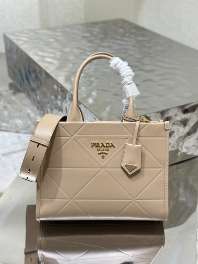 Bolso Prada Symbole pequeño con pespuntes Beige