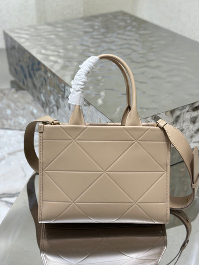 Bolso Prada Symbole pequeño con pespuntes Beige